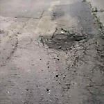 Potholes at 12220 55 Street NW