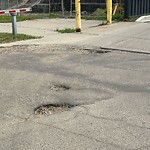 Potholes at 8708 149 Street NW