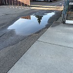 Pooling water due to Depression on Road at 13211 117 Street NW