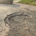 Potholes at 11715 40 Avenue NW