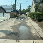 Pooling water due to Depression on Road at 10108 144 Street NW