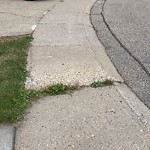 Sidewalk Concern at 318 Grand Meadow Crescent NW