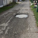 Potholes at 15103 94 Avenue NW