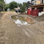 Pooling water due to Depression on Road at 6904 107 B Ave Nw, Edmonton T6 A 1 N7