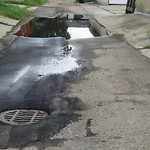 Pooling water due to Depression on Road at 11461 152 B Ave NW