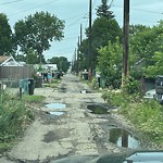 Pooling water due to Depression on Road at 12220 85 Street NW