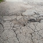 Potholes at 9919 146 Street NW