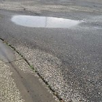 Pooling water due to Depression on Road at 15503 135 Street NW