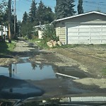 Pooling water due to Depression on Road at 12116 40 Ave Nw, Edmonton T6 J 0 S5