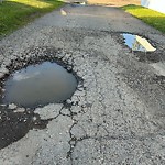 Potholes at 16703 98 Avenue NW