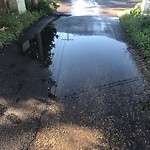 Pooling water due to Depression on Road at 6031 105 B Street NW