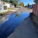 Pooling water due to Depression on Road at 15007 70 Street NW