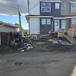 Overflowing Garbage Cans at 7607 137 Avenue NW