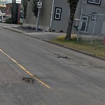 Potholes at 9911 76 Avenue NW