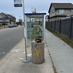 Overflowing Garbage Cans at 603 Cy Becker Drive NW