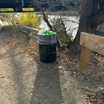 Overflowing Garbage Cans at 8630 Rowland Road NW