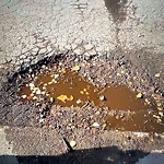 Potholes at 7310 99 Street NW