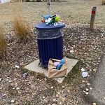 Overflowing Garbage Cans at 2155 69 Street SW