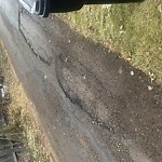 Potholes at 16110 87 Ave NW