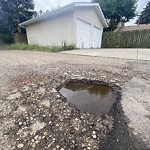 Potholes at 8726 164 St Nw, Edmonton T5 R 2 R1