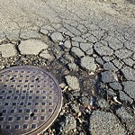 Potholes at 10723 32 Street NW