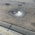 Potholes at 17803 110 Street NW
