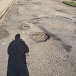 Potholes at 7007 28 Avenue NW