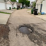 Potholes at 1115 76 Street SW